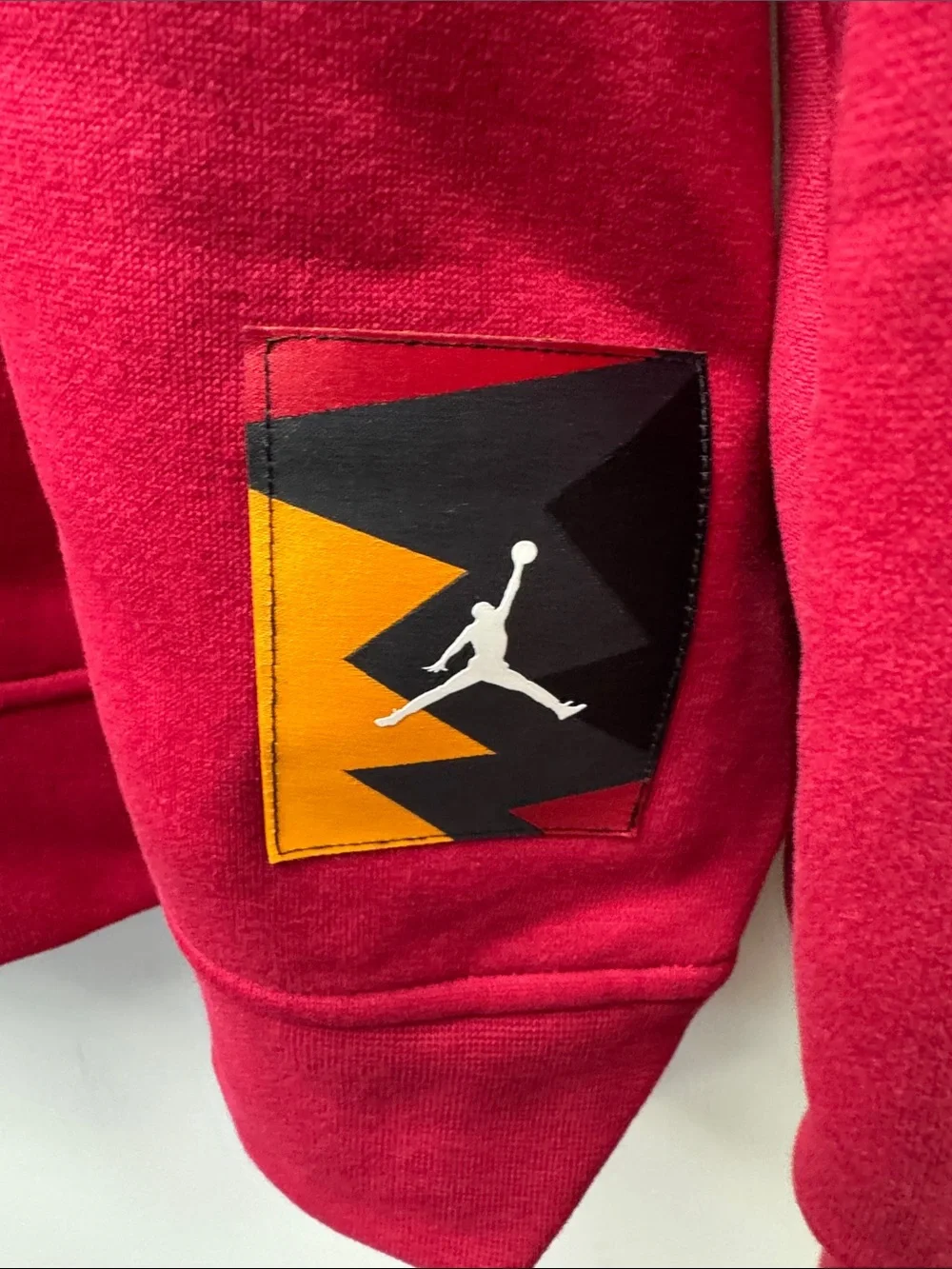 Jordan Red Hoodie with Yellow Lightning Bolt Graphic